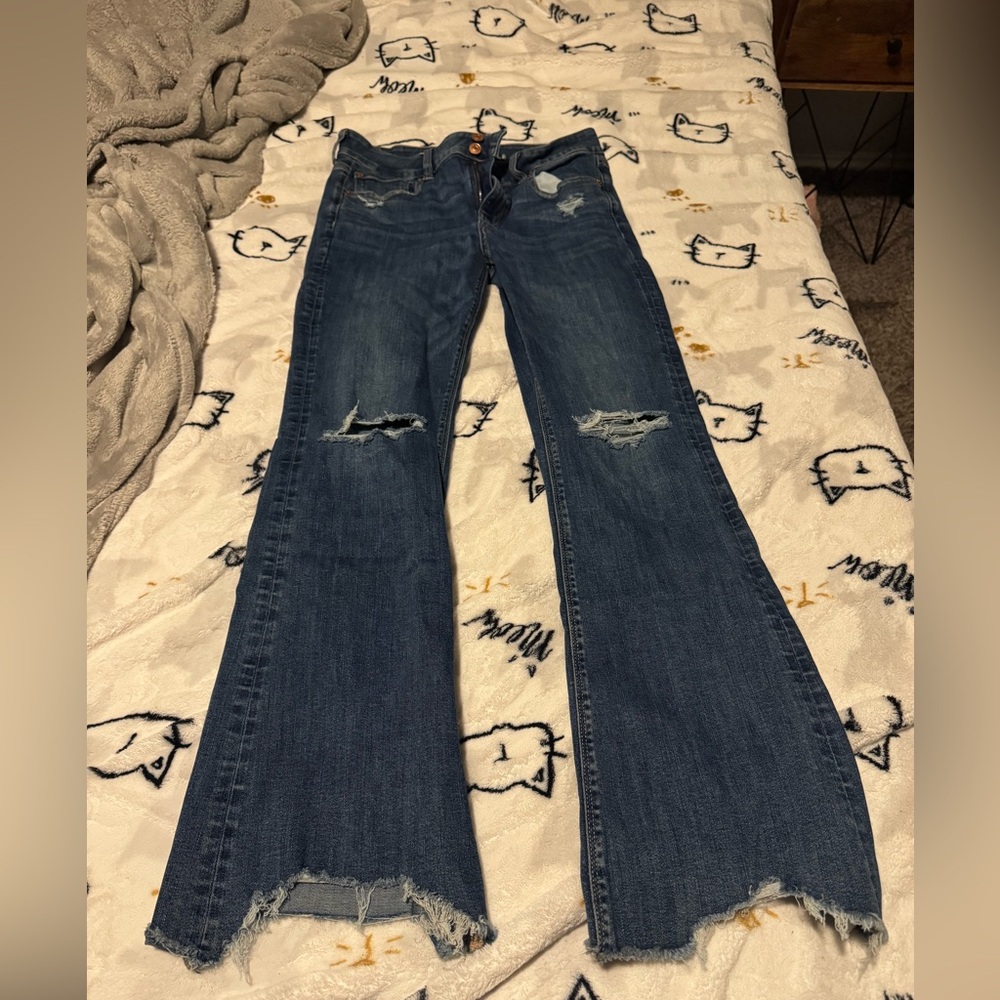 American Eagle Jeans - Boot cut, distressed, super stretch.